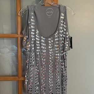Sparkly silver top from Macy’s. International concepts, size extra-large.